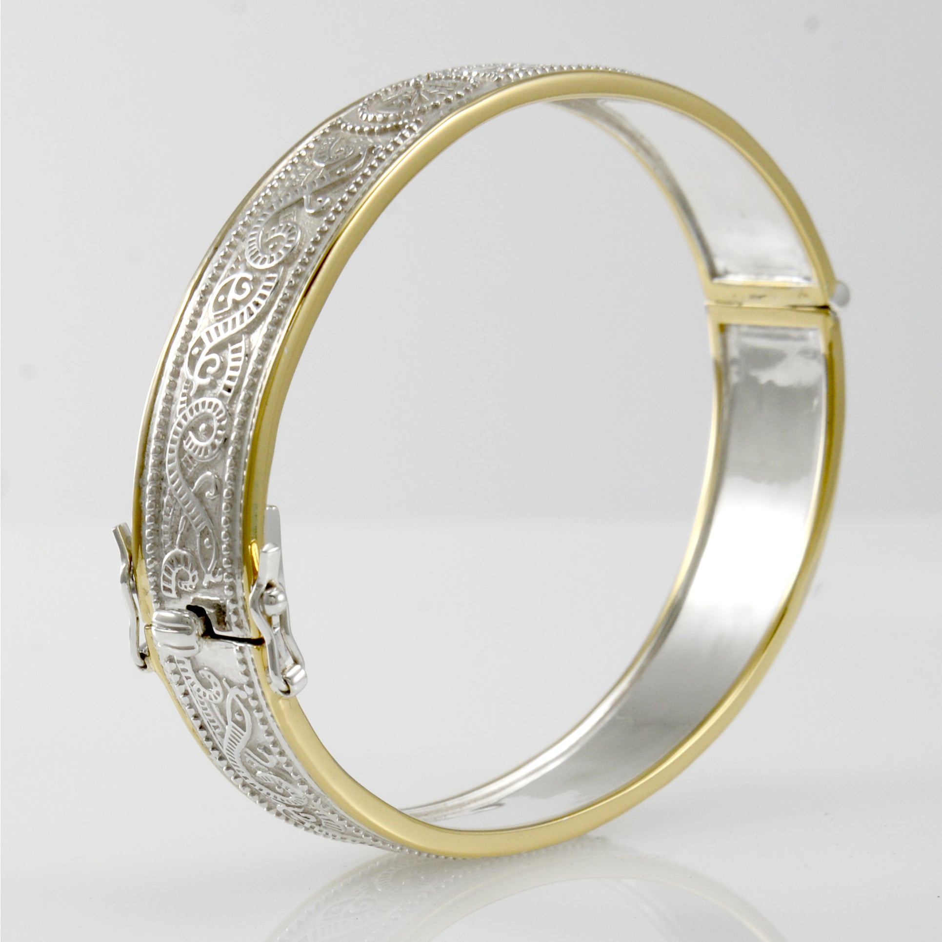 Small Silver and 14K Gold Accent Border Celtic Bangle with open lock MBA211