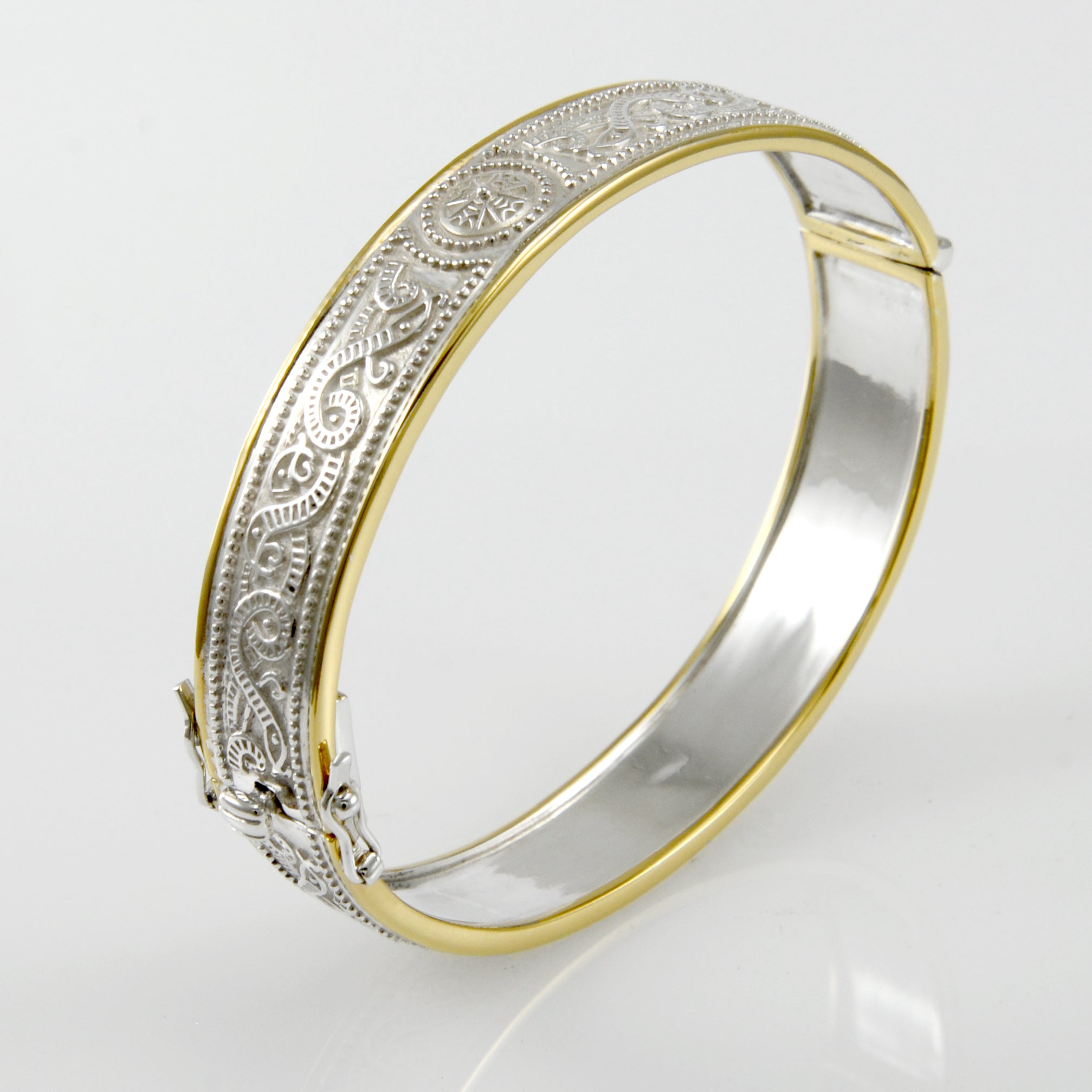 Small Silver and 14K Gold Accent Border Celtic Bangle with open lock MBA211